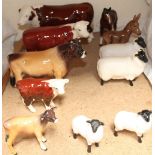 A Beswick bull together other Beswick cows and calves,