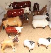 A Beswick bull together other Beswick cows and calves,