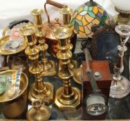 Copper kettles together with brass candlesticks, oil lamp, table lamp, scales, lamp,