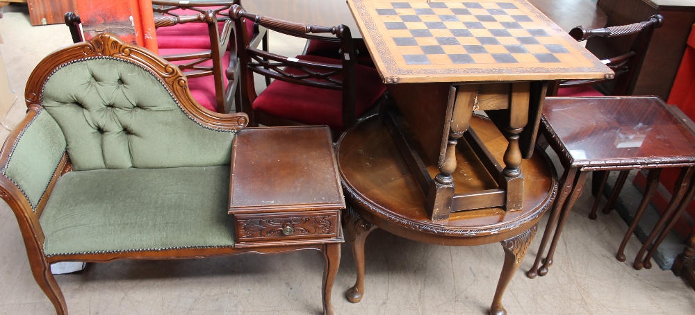 A telephone table together with a round coffee table, a nest of tables,