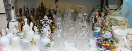 Assorted pottery bells, glass bells and brass bells, children's china,