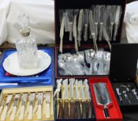 An electroplated Viners cased part flatware service together with a decanter,