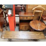 A 20th century oak bench together with an occasional table,