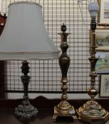 Two brass table lamps together with a silvered table lamp