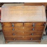 An 18th century oak bureau,