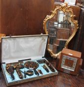 A Faux tortoiseshell cased dressing table set together with a gilt wall mirror and a walnut mantle