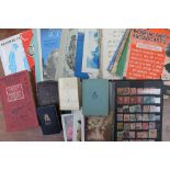 A stamp album containing World Stamps including Penny Reds, Two Pence blue, Canadian stamps,