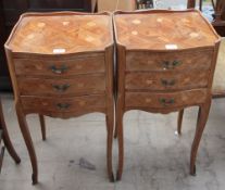 A pair of 20th century French kingwood and marquetry decorated three drawer bedside cabinets on