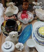 A Gaudy Welsh pottery jug together with other jugs, a Staffordshire dog, commemorative mugs,