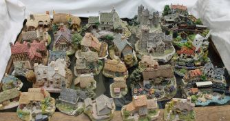 A collection of Lilliput Lane cottages and Danbury Mint Country Lines Collection models etc