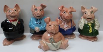 A set of five Wade Natwest piggy banks with stoppers