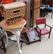 A cast iron pub table together with a Childs chair,