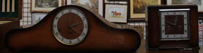 A walnut Symphonie mantle clock together with a small walnut mantle clock