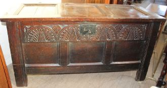 An 18th century oak coffer,