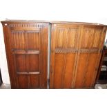 A 20th century oak hall robe together with two other oak wardrobes