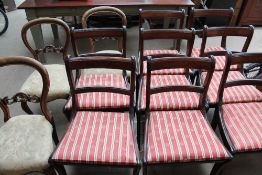 A set of eight reproduction mahogany dining chairs together with a set of three Victorian balloon