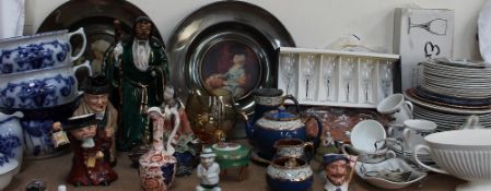 A Royal Doulton toby jug, Winston Churchill, together with oriental figures, Flo blue chamber pots,