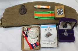 World War II medals including the War Medal and The Defence Medal in a box addresses to "Capt P H