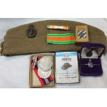 World War II medals including the War Medal and The Defence Medal in a box addresses to "Capt P H