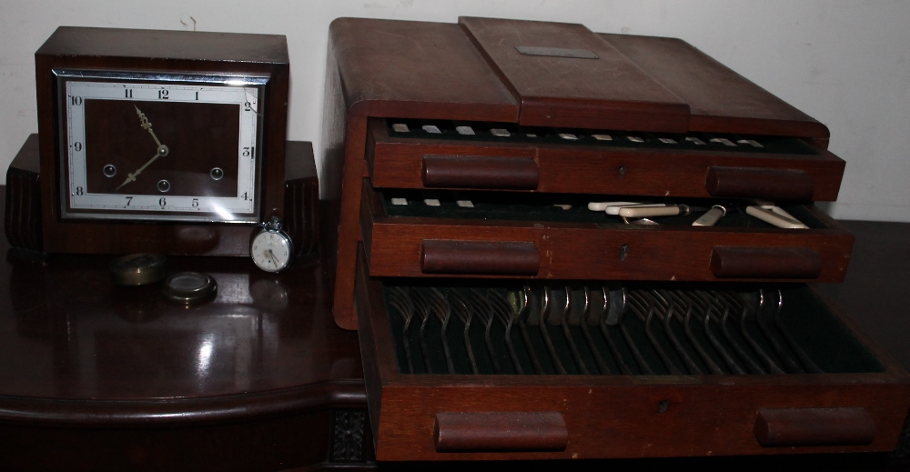 An EPNS cased flatware service together with a clock and cased services watch