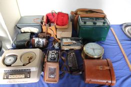 A Grundig Stenorette together with a Roberts type R66 radio, a Voigtlander Brilliant camera,