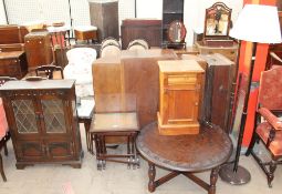 A 20th century oak bookcase together with a nest of tables, two standard lamps,