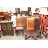 A 20th century oak bookcase together with a nest of tables, two standard lamps,