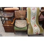 An Edwardian nursing chair with a floral tapestry panel, together with an elbow chair,