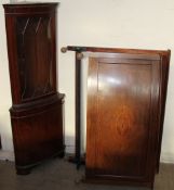 A reproduction mahogany standing corner cupboard together with an Edwardian mahogany double bed