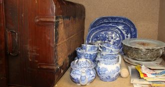 A tin trunk together with a Copeland Spode's Italian blue and white pottery part tea set together