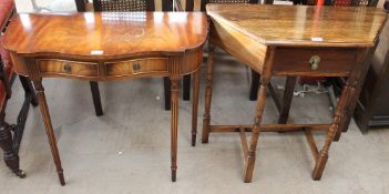 A 20th century mahogany hall table together with an oak hall table