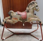 A tin plate rocking horse