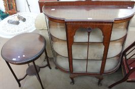 A 20th century walnut display cabinet together with a mahogany occasional table