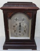 An early 20th century mahogany bracket clock, with a domed top,