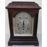 An early 20th century mahogany bracket clock, with a domed top,