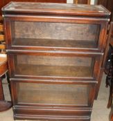 A 20th century oak three section bookcase