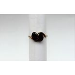 A two stone garnet ring,