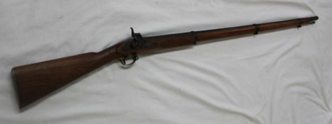 A 19th century walnut and steel percussion rifle, with a 114cm steel barrel and ramrod,