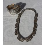 A Mexican white metal bracelet and matching necklace with geometric decoration marked Sterling 925
