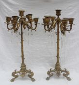 A pair of 19th century French ormolu candelabra, with six branches with leaf decoration,