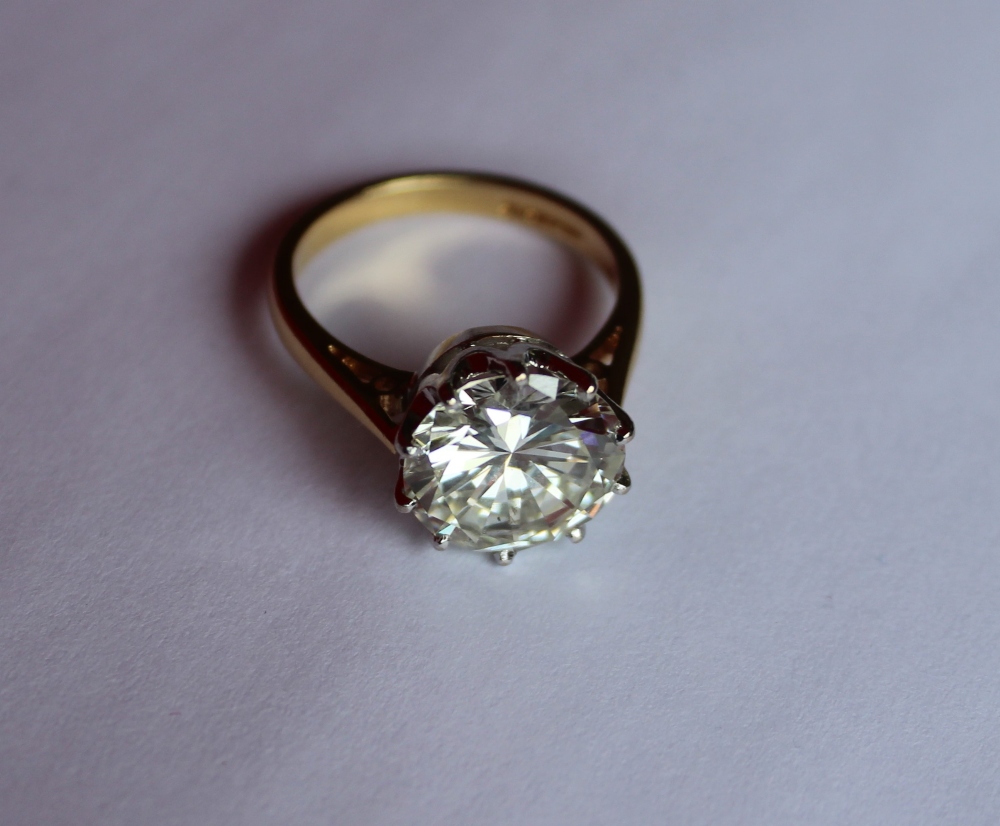 A 4.25ct solitaire diamond ring, the round brilliant cut diamond measuring approximately 10.76-10. - Image 10 of 14
