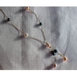 An 18ct yellow gold and white, pink and grey pearl necklace,