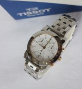 A Gentleman's Tissot Seastar chronograph wristwatch, the white dial with batons,