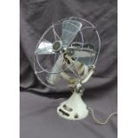 A Veritys 'The new 12" New Orbit Fan' in white,