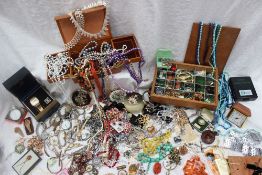 Assorted costume jewellery including necklaces, earrings, brooches, wristwatches, rings,