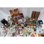 Assorted costume jewellery including necklaces, earrings, brooches, wristwatches, rings,