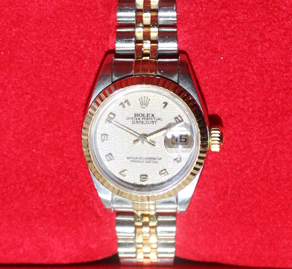 A Lady's stainless steel Rolex oyster perpetual Datejust wristwatch with a "Rolex impressed dial"