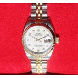 A Lady's stainless steel Rolex oyster perpetual Datejust wristwatch with a "Rolex impressed dial"