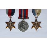 Three World War II medals including The British War Medal,