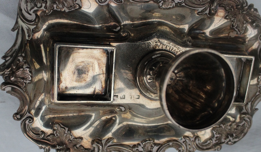 A late Victorian silver desk standish, with a central urn and two glass and silver topped inkwells, - Image 4 of 5